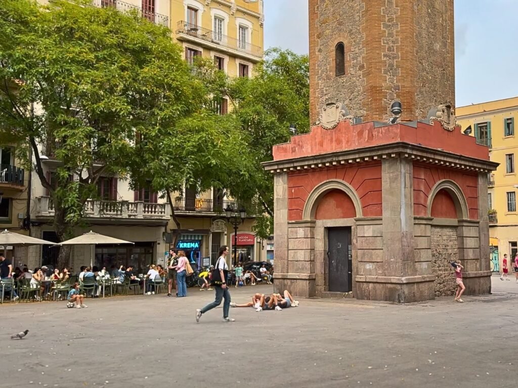 Walkable neighborhood street with cafes and local daily life